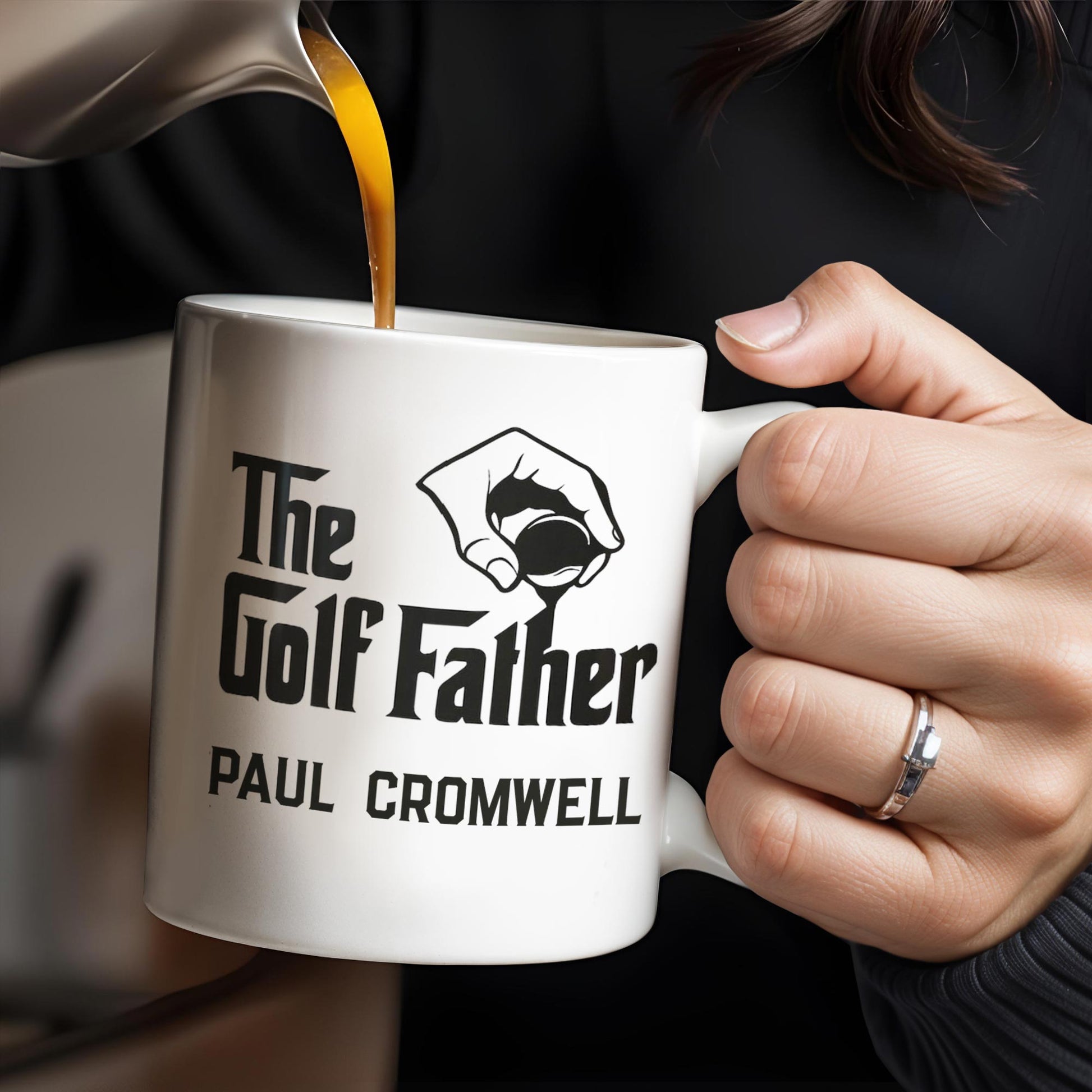 The Golf Father, Hand Holding Golf Ball