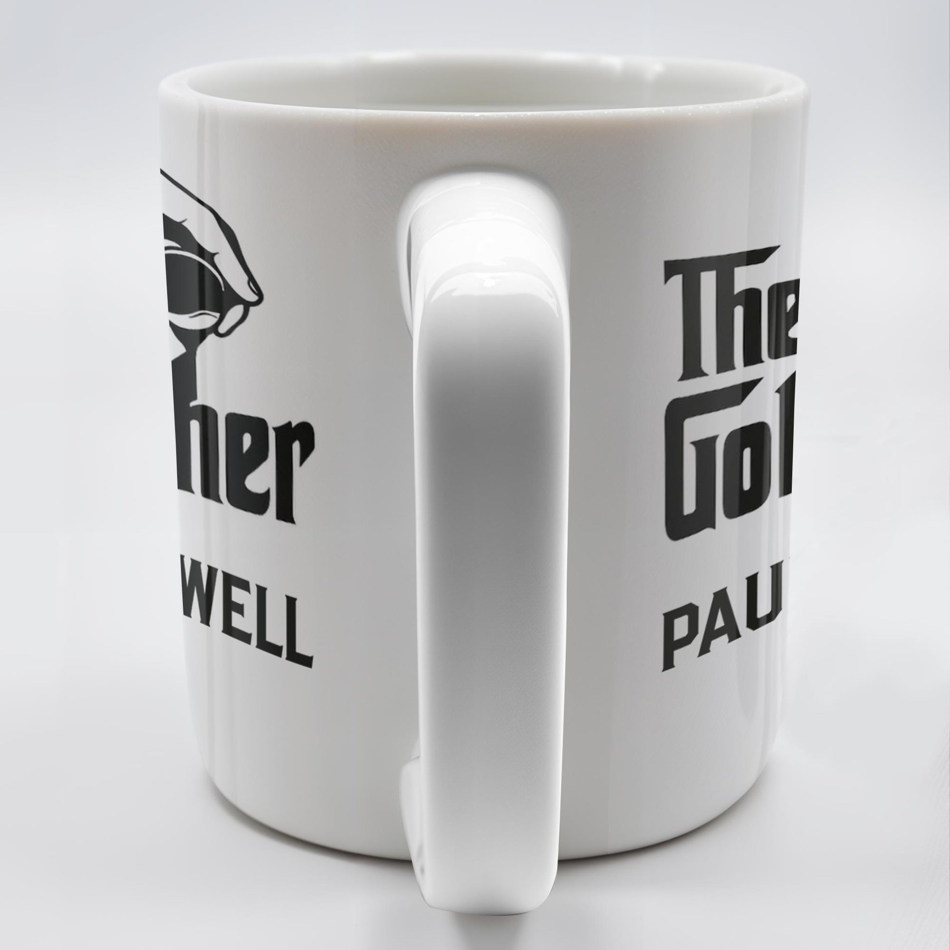 The Golf Father, Hand Holding Golf Ball