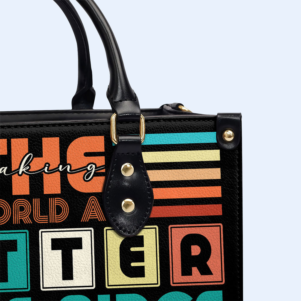 Haciendo del mundo un lugar mejor - Bolso de mano de cuero personalizado - MM17