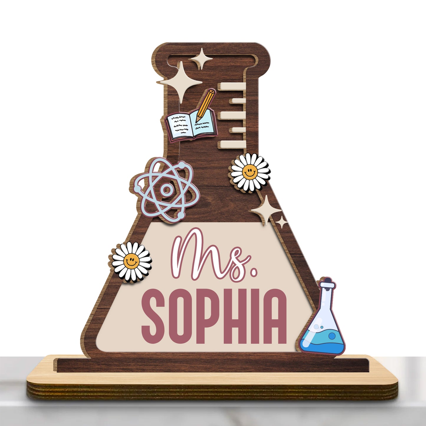 Celebrate Knowledge With Daisies, Atom Model, Notebook, and Beaker