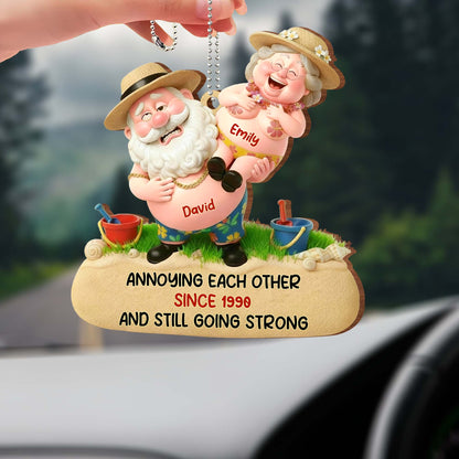 Annoying Each Other And Still Going Strong, Elderly Couple On Beach