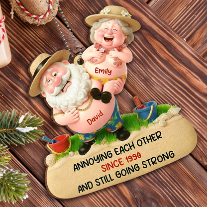 Annoying Each Other And Still Going Strong, Elderly Couple On Beach