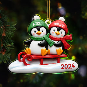 Waddle Into The Holiday Spirit Together With Penguins On A Sled