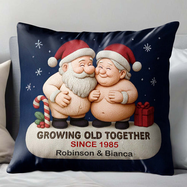 Growing Old Together, Two Santa Clauses Embrace