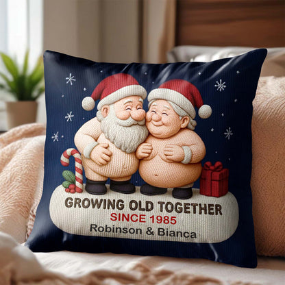 Growing Old Together, Two Santa Clauses Embrace