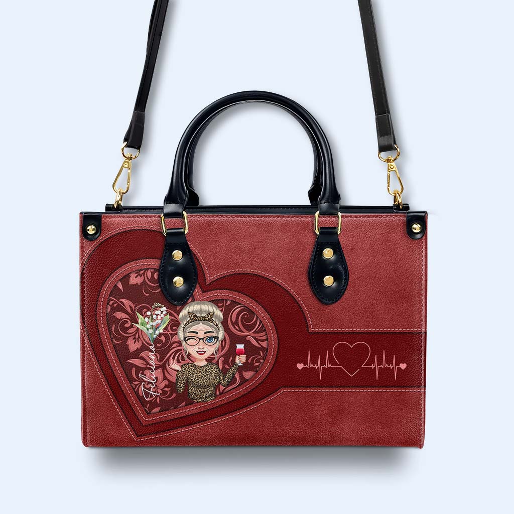 A Lady Enjoying Her Wine With Heart Design