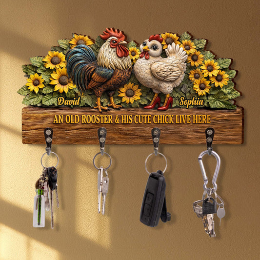 An Old Rooster & His Cute Chick Live Here