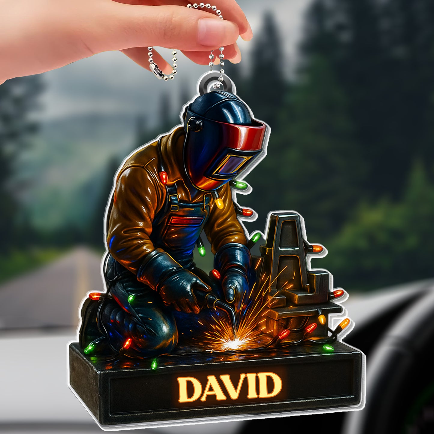 Skilled Welder At Work With Festive Lights