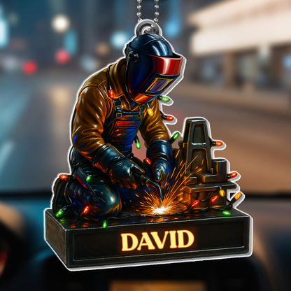Skilled Welder At Work With Festive Lights