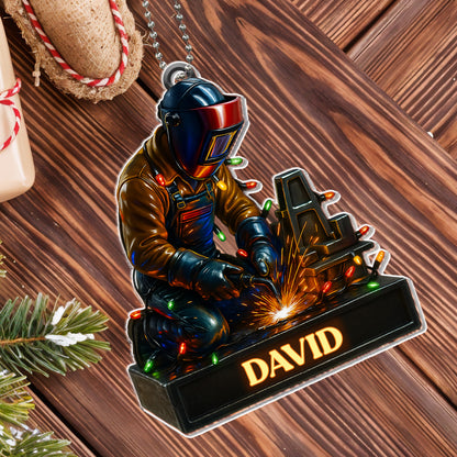 Skilled Welder At Work With Festive Lights